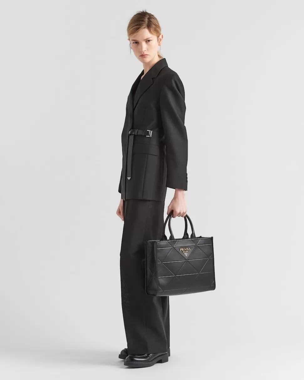Shop Prada Mittelgroße Symbole Tasche Aus Leder Mit Ziersteppung Schwarz