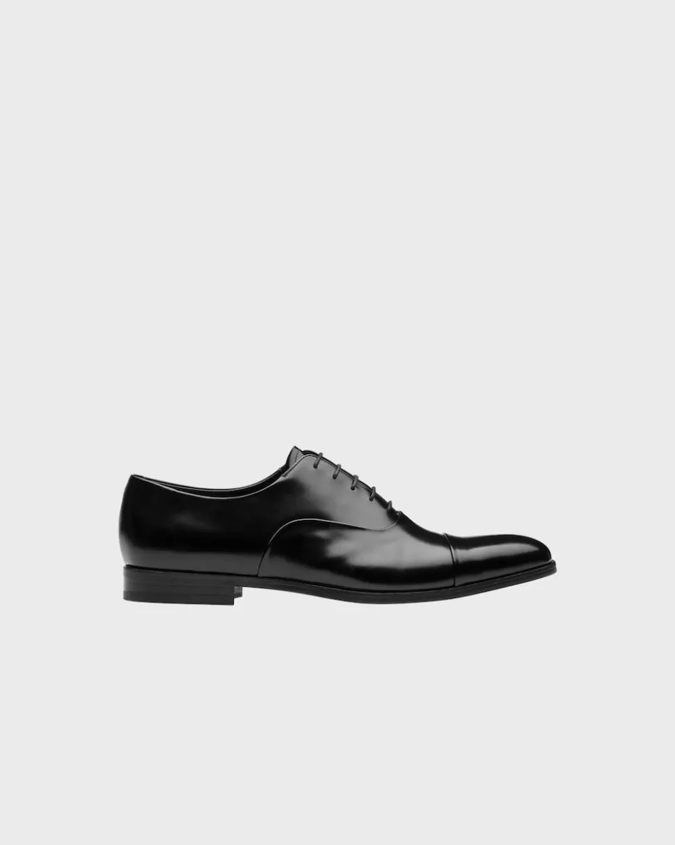 Shop Prada Oxford-schnürschuhe Aus Gebürstetem Leder Schwarz