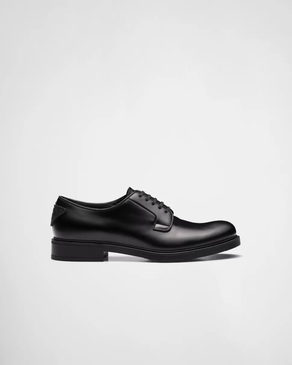 Shop Prada Schnürschuhe Aus Gebürstetem Leder Schwarz
