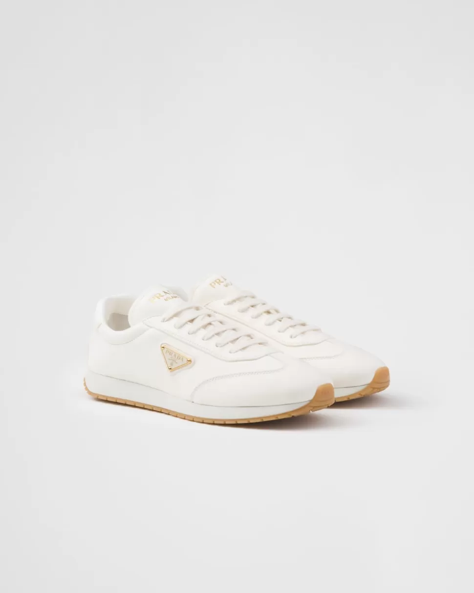 Store Prada Sneaker Aus Leder Elfenbein