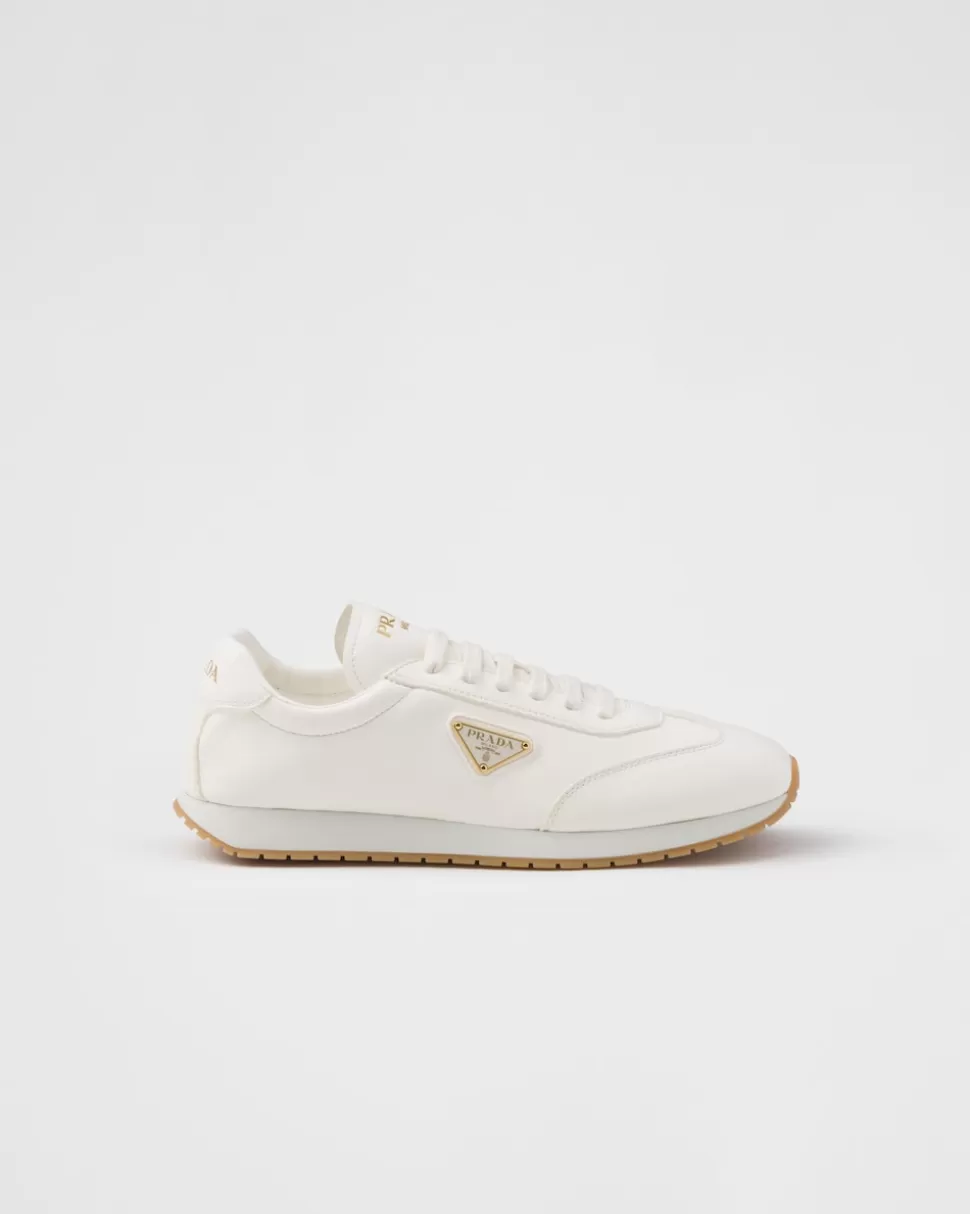 Store Prada Sneaker Aus Leder Elfenbein