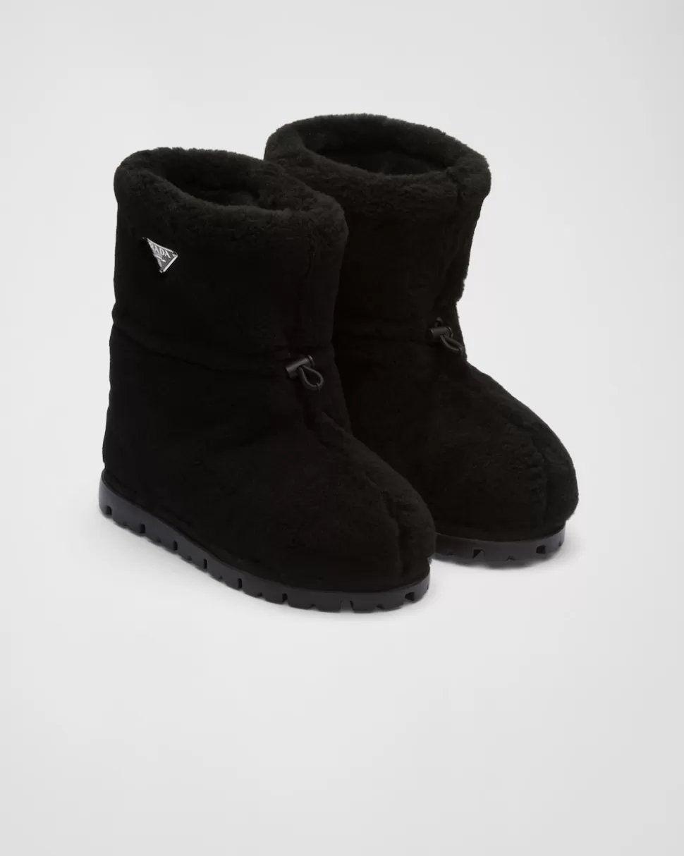 Online Prada Stiefeletten Aus Lammfell Schwarz
