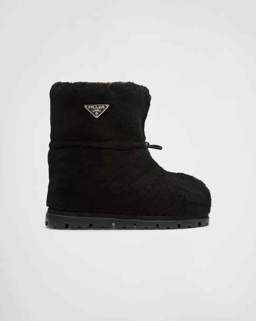 Online Prada Stiefeletten Aus Lammfell Schwarz